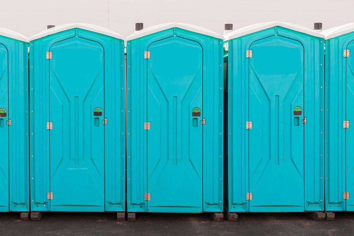 Industrial portable restroom units at a plant in Santa Fe, New Mexico